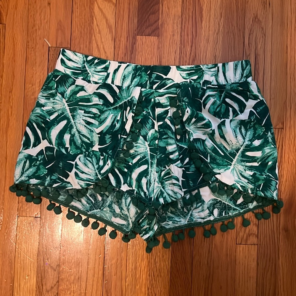 Green palm tree print Pom Pom shorts